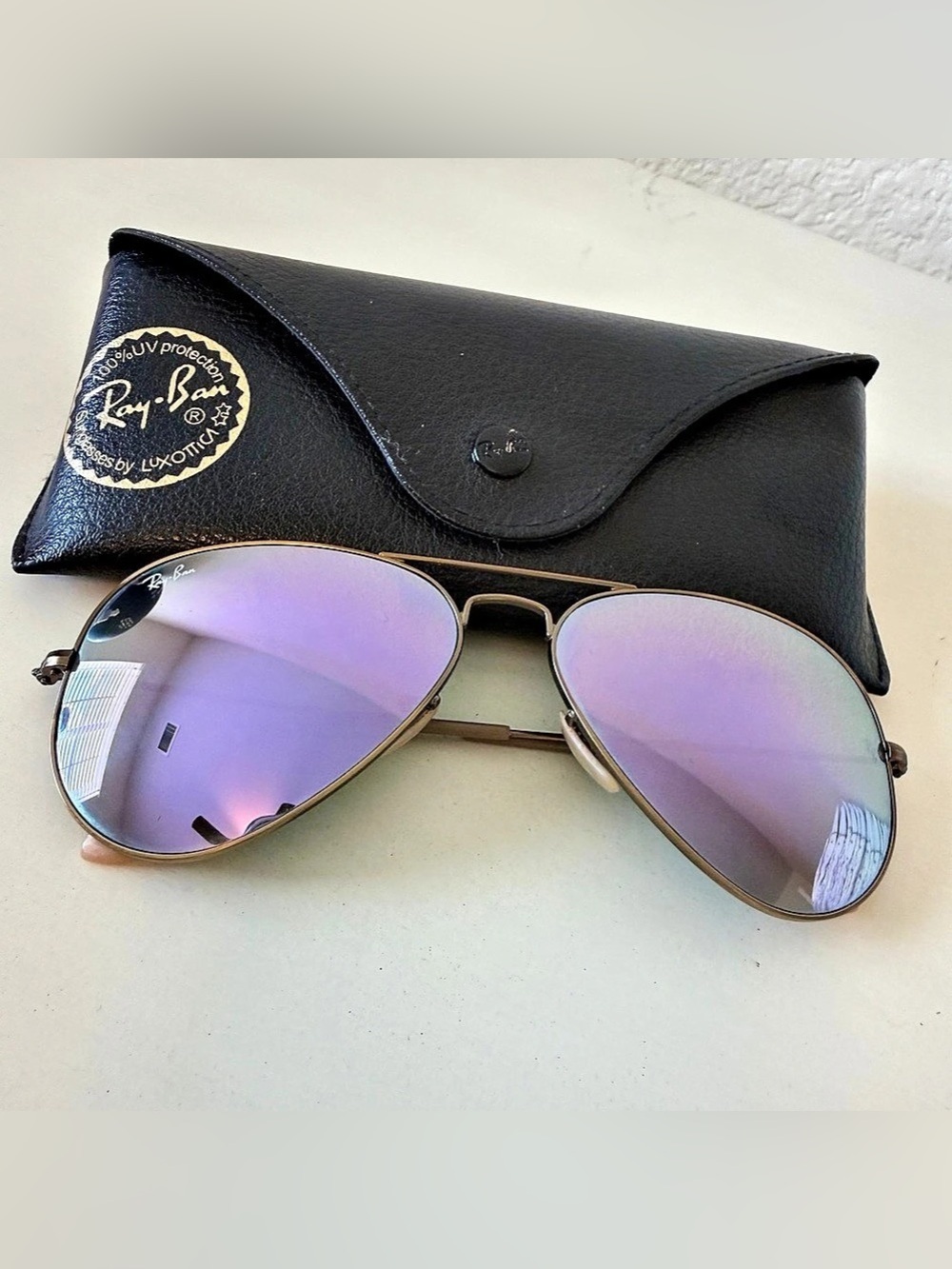 Ray-Ban RB3025 Aviator with lilac lenses